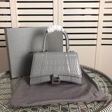 Close-up detail of sleek classic women's handbag – women's designer-style accessory