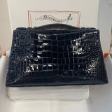 Side view of sleek structured handbag