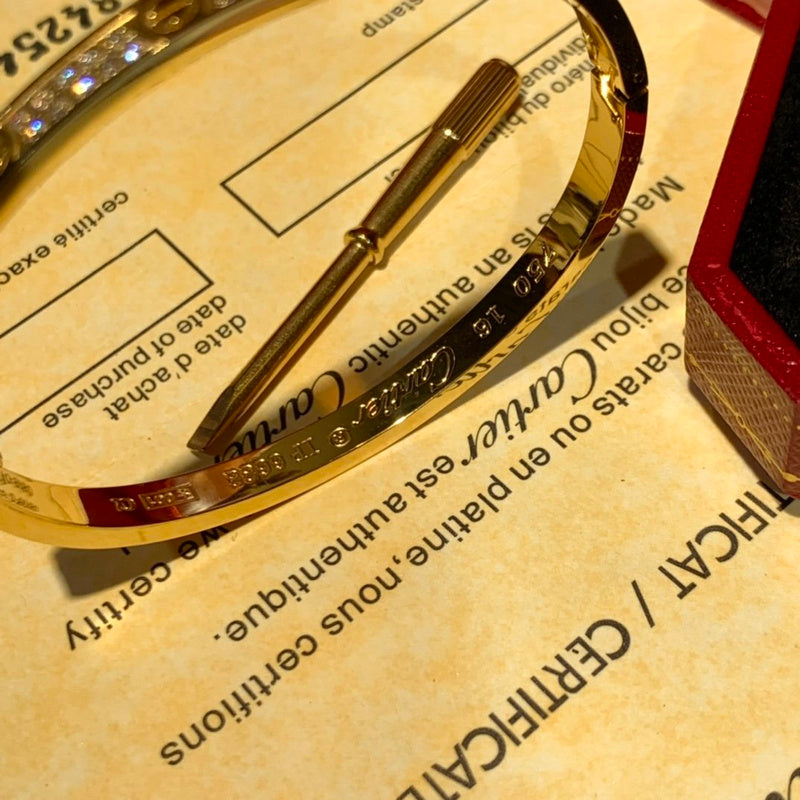 Close-up detail view of Cartier unisex jewelry piece
