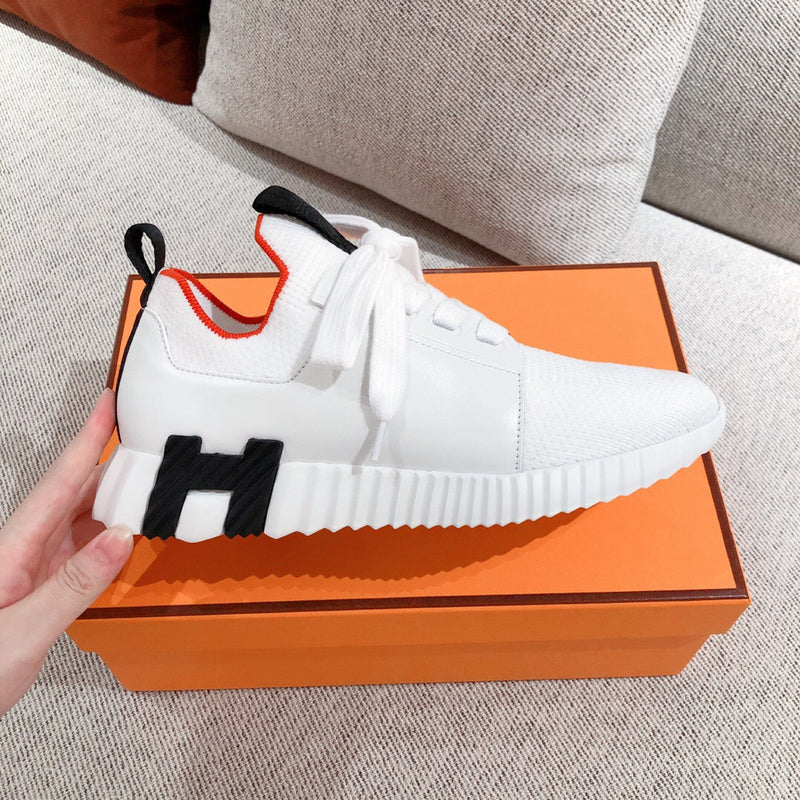 Hermès Nude Slip-On Sneakers - Angled View
