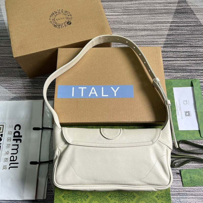 Styled lifestyle shot of statement sleek women's handbag – women's statement bag