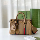 Handle and strap detail of statement polished women's handbag – women's everyday handbag