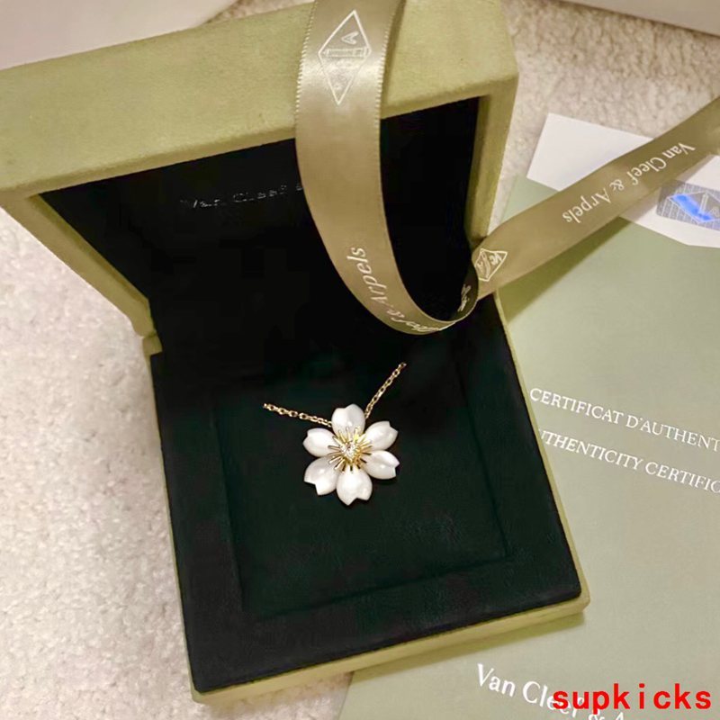 Lifestyle view of Van Cleef & Arpels unisex jewelry piece