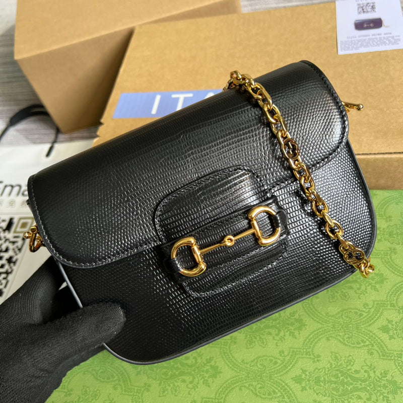 Front view of structured classic women's handbag – women's luxury accessory