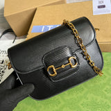 Front view of structured classic women's handbag – women's luxury accessory