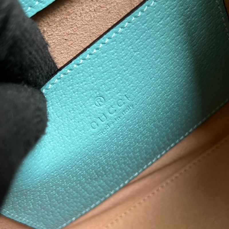 Side profile of signature classic women's handbag – women's designer-style accessory