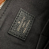 Handle and strap detail of modern statement women's handbag – women's designer-style accessory