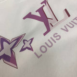 Flat lay presentation of Louis Vuitton luxury clothing with tailored silhouette