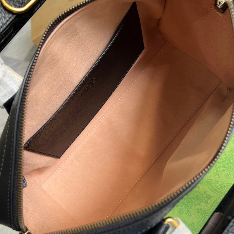 Side profile of chic sleek women's handbag – women's luxury handbag