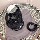 Styled lifestyle shot of everyday-luxe elevated women's handbag – women's luxury accessory