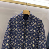 Side profile of Louis Vuitton luxury clothing with signature branding