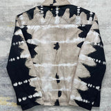 Side profile of Louis Vuitton luxury clothing with label-forward styling