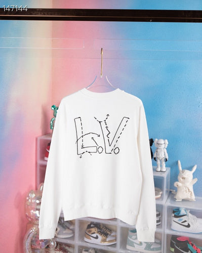 Full styled look of Louis Vuitton luxury clothing with tailored silhouette