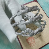 Close-up detail view of Cartier unisex jewelry piece