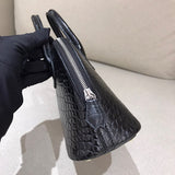 Sleek bag shown from front angle