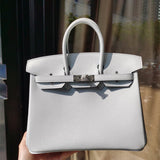  Streamlined structured bag carried on shoulder
