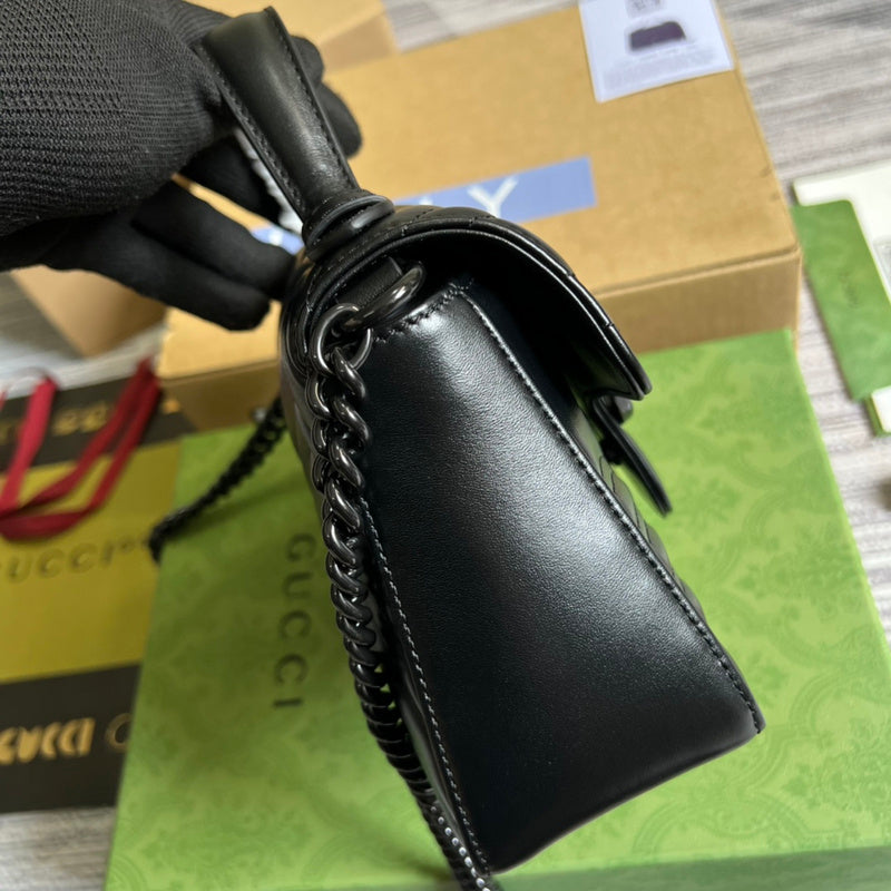 Styled lifestyle shot of polished statement women's handbag – women's designer-style accessory