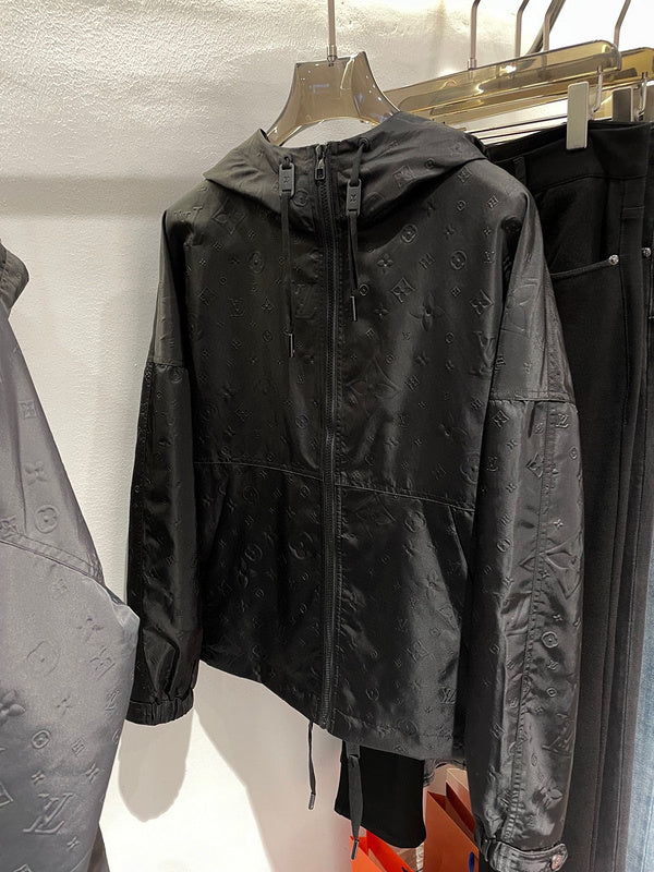 Close-up detail shot of Louis Vuitton luxury clothing with relaxed-fit cut