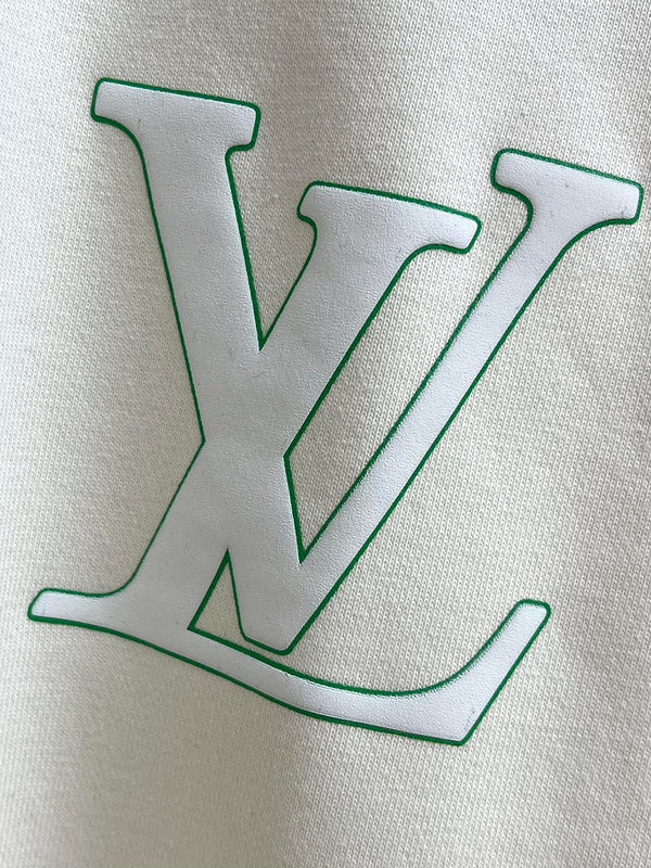 Flat lay presentation of Louis Vuitton luxury clothing with logo-detail design