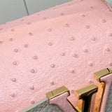  Tailored top-handle bag carried on shoulder