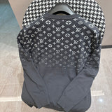 Side profile of Louis Vuitton luxury clothing with label-forward styling