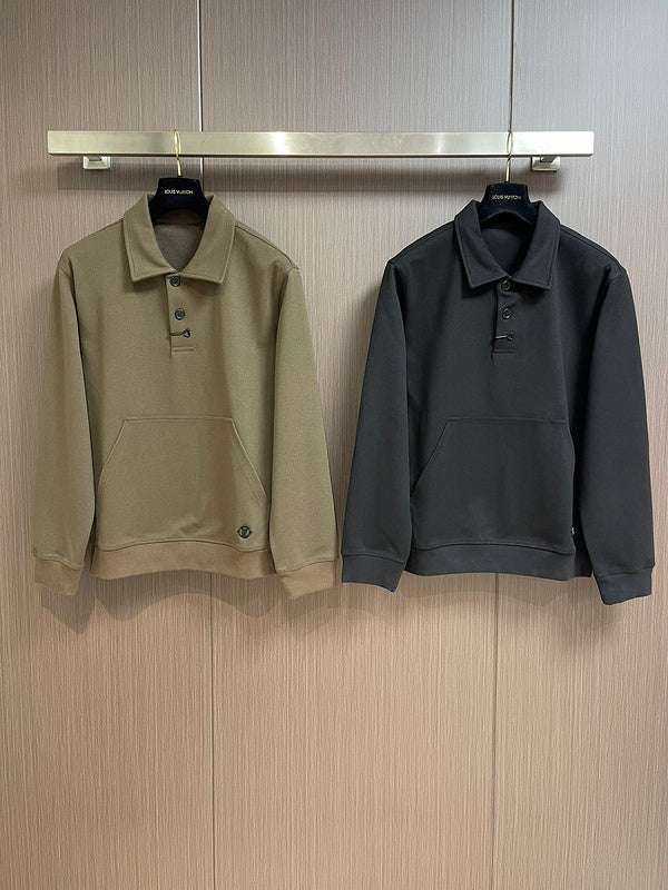Close-up detail shot of Louis Vuitton luxury clothing with signature branding