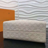 Styled lifestyle shot of chic everyday-luxe women's handbag – women's luxury accessory