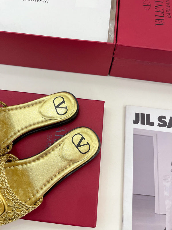 Three-quarter angle view of Valentino Garavani luxury piece style No.250