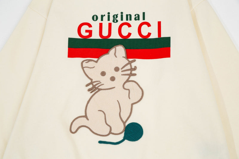 Flat lay presentation of Gucci luxury clothing with contemporary cut