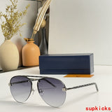 Close-up detail view of Louis Vuitton unisex sunglasses