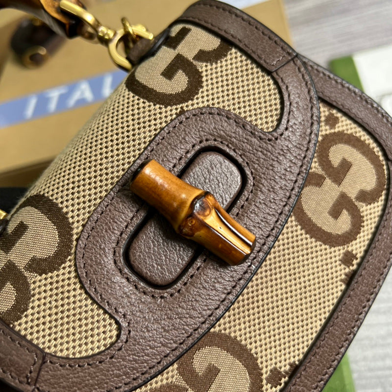 Interior view of structured signature women's handbag – women's statement bag