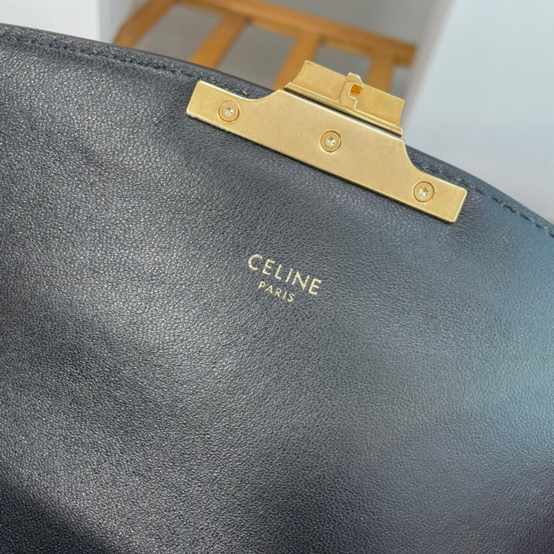 Styled lifestyle shot of statement refined women's handbag – women's designer-style accessory