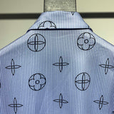 Flat lay presentation of Louis Vuitton cotton t-shirt with signature branding