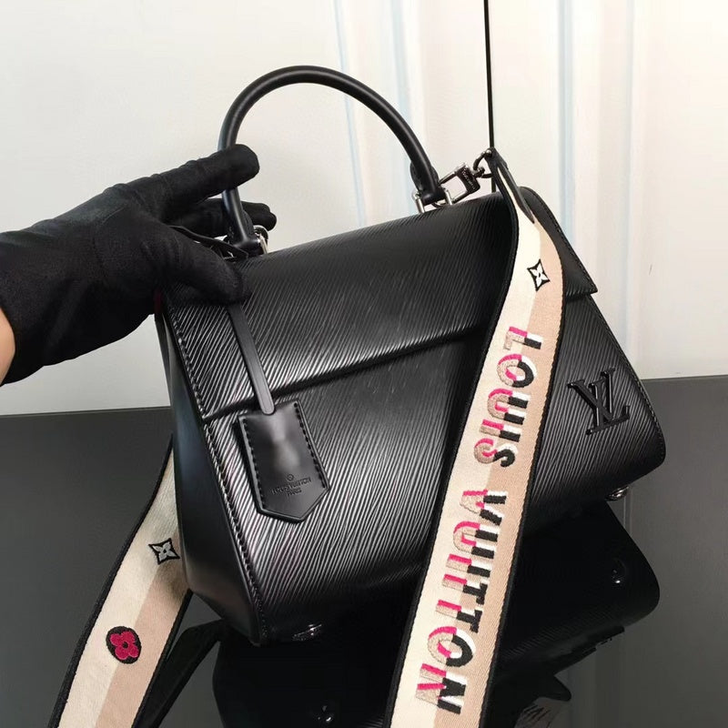 Side profile of sleek statement women's handbag – women's premium purse