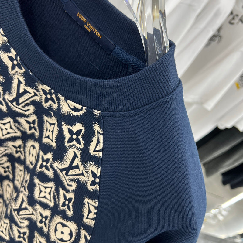 Flat lay presentation of Louis Vuitton luxury clothing with relaxed-fit cut