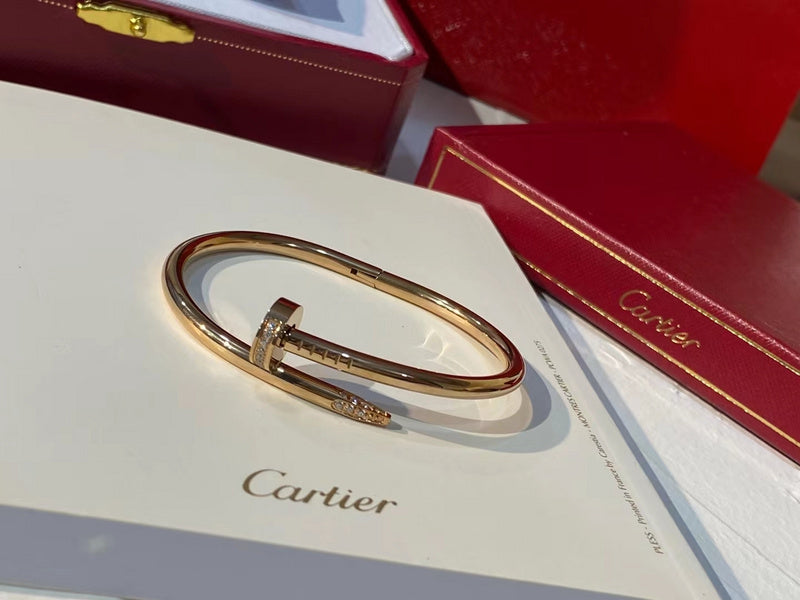 Front view of Cartier unisex jewelry piece