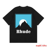 Flat lay presentation of Rhude luxury clothing with tailored silhouette