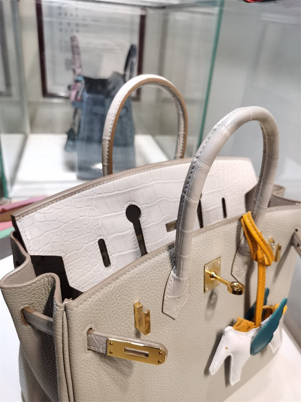 Side view of considered structured handbag