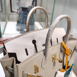 Side view of considered structured handbag