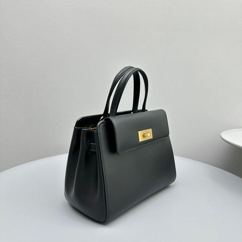 Zivas Charm Timeless Appeal Statement Handbag (Signature Shape & Finish) – Lifestyle Shot