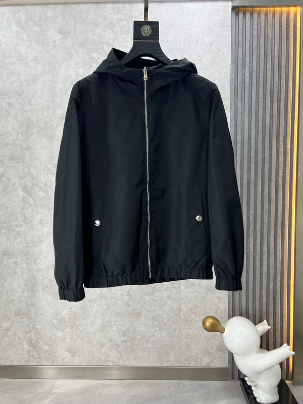 Front view of Louis Vuitton luxury clothing with label-forward styling