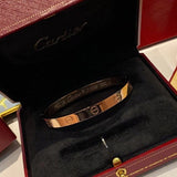 Close-up detail view of Cartier unisex jewelry piece