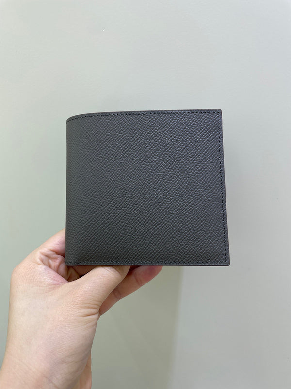 Side view of sculpted structured handbag