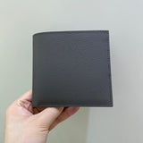 Side view of sculpted structured handbag