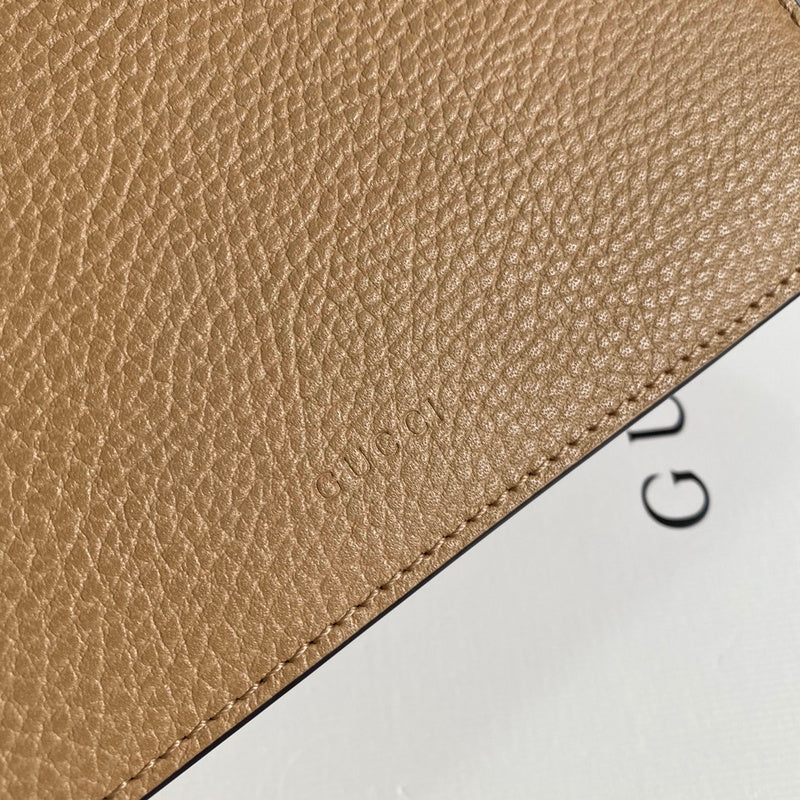 Styled lifestyle shot of sleek polished women's handbag – women's statement bag