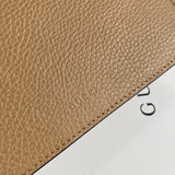 Styled lifestyle shot of sleek polished women's handbag – women's statement bag