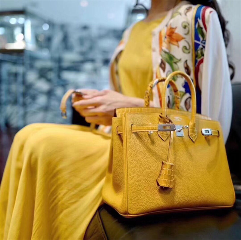  signature handbag styled with outfit
