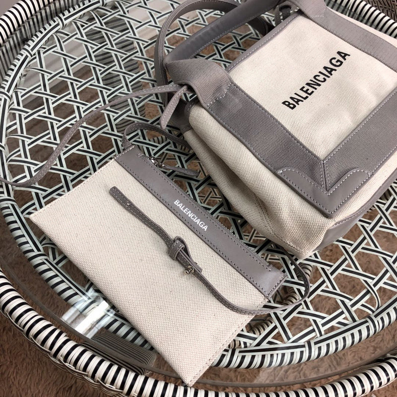 Styled lifestyle shot of signature polished women's handbag – women's luxury handbag