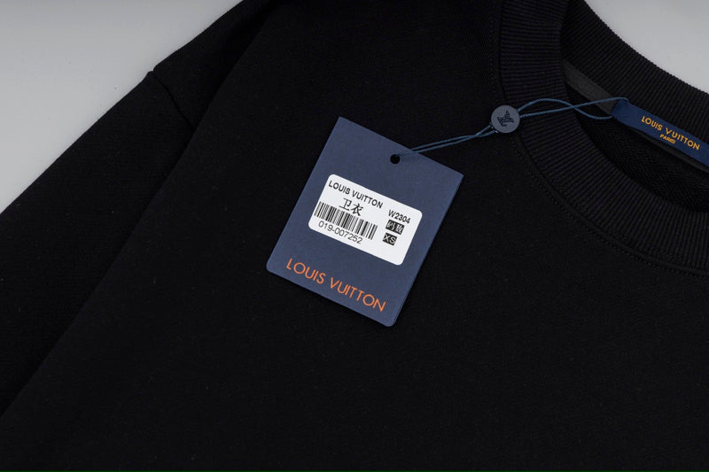 Full styled look of Louis Vuitton luxury clothing with relaxed-fit cut