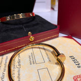 Angled view of Cartier unisex jewelry piece